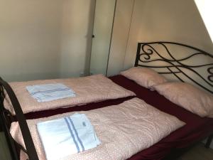 Postel nebo postele na pokoji v ubytování Pension Adler