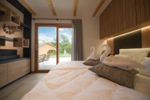 Ένα ή περισσότερα κρεβάτια σε δωμάτιο στο Chalet Zana
