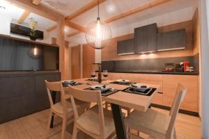 Kuchyň nebo kuchyňský kout v ubytování Chalet Zana