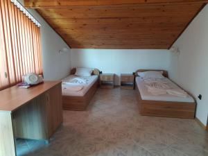 Postel nebo postele na pokoji v ubytování Vladimirov Guest House
