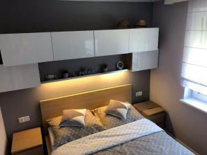 Posteľ alebo postele v izbe v ubytovaní Apartament BD Premium II Klifowa + 35 fotografií