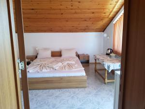 Postel nebo postele na pokoji v ubytování Vladimirov Guest House