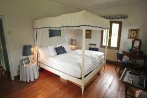 Katil atau katil-katil dalam bilik di Villa Roncavezzai