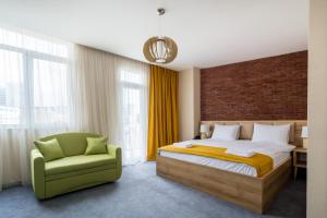 Postel nebo postele na pokoji v ubytování Hotel London