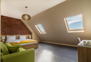Postel nebo postele na pokoji v ubytování Hotel London