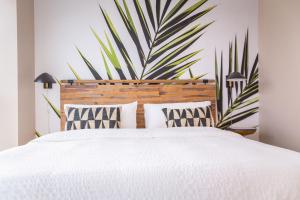 Postelja oz. postelje v sobi nastanitve Monte Carlo Miami Beach