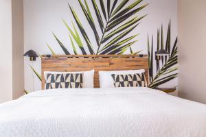 Cama ou camas em um quarto em Monte Carlo Miami Beach