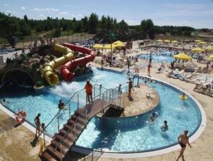 a group of people in a water park at Domki Nadmorska Oaza nad morzem i jeziorem in Jezierzany