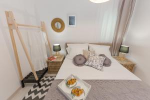 Postel nebo postele na pokoji v ubytování Apartment Lara