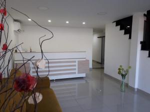 The lobby or reception area at Hotel Joma