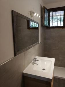 Kylpyhuone majoituspaikassa Appartamento Supramonte