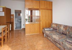 Kuchyň nebo kuchyňský kout v ubytování Apartmani Ujdur