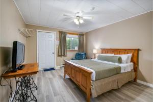 Krevet ili kreveti u jedinici u okviru objekta Long Sault Motel