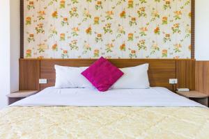 Postel nebo postele na pokoji v ubytování Kenting Maya-House B&B