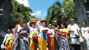 a group of people posing for a picture at Menjangan Bali Homestay in Banyuwedang