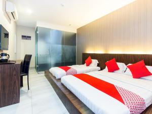 Katil atau katil-katil dalam bilik di Super OYO 340 Comfort Hotel