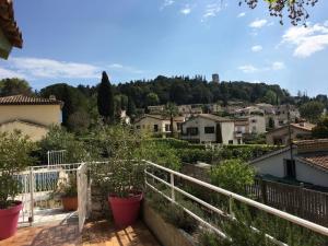 a view from the balcony of a house at Le Jacaranda in Villeneuve-Loubet