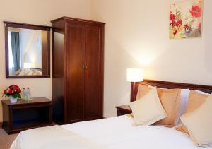 Łóżko lub łóżka w pokoju w obiekcie Hotel Nowodwory