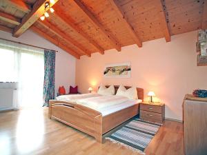 Postel nebo postele na pokoji v ubytování Ferienhaus Flatscher
