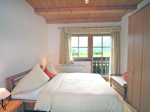 Posteľ alebo postele v izbe v ubytovaní Ferienhaus Flatscher