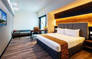 Postel nebo postele na pokoji v ubytování Hotel Armada Petaling Jaya