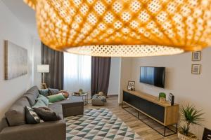 TV a/nebo společenská místnost v ubytování Apartment Lara