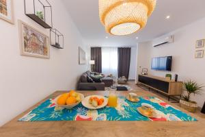 TV a/nebo společenská místnost v ubytování Apartment Lara
