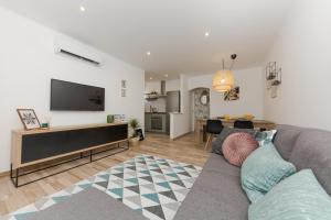 TV a/nebo společenská místnost v ubytování Apartment Lara