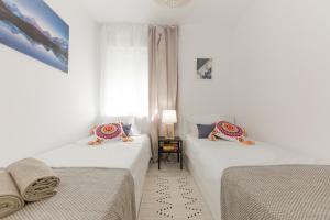 Postel nebo postele na pokoji v ubytování Apartment Lara