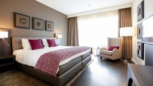 Postel nebo postele na pokoji v ubytování Hotel Thermen Bussloo - Apeldoorn