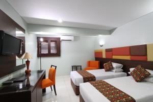 Letto o letti in una camera di Hotel Alma
