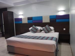 Letto o letti in una camera di Hotel Alma