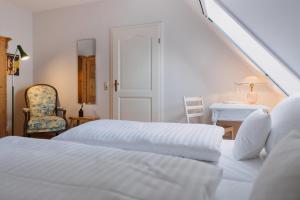 Postel nebo postele na pokoji v ubytování Villa Breitenberg + 37 fotografií