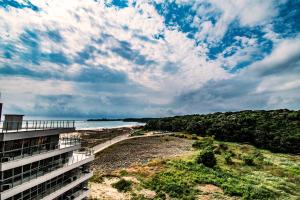a view of the beach from a building at Zornitsa Apart in Primorsko