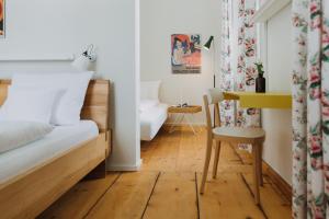 Postel nebo postele na pokoji v ubytování Villa Breitenberg