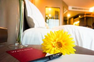 Кровать или кровати в номере GLOW Sukhumvit 5