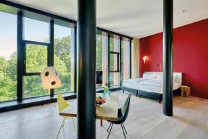 Letto o letti in una camera di Sorell Hotel Rigiblick - Studios & Spa Suites