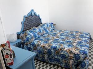 Posteľ alebo postele v izbe v ubytovaní La finestrella dell’arte un orizzonte da guardare