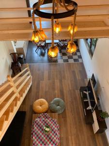 an overhead view of a living room with a chandelier at Guest house Tivko Katce Gostivar in Gostivar