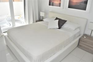 מיטה או מיטות בחדר ב-Villa Mel III
