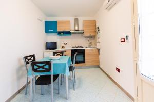 Kuchyň nebo kuchyňský kout v ubytování B&B La Casa nel Borgo