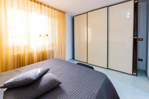 Postel nebo postele na pokoji v ubytování B&B La Casa nel Borgo