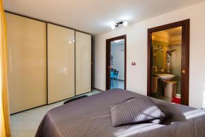 Postel nebo postele na pokoji v ubytování B&B La Casa nel Borgo