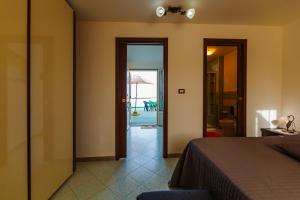 Postel nebo postele na pokoji v ubytování B&B La Casa nel Borgo