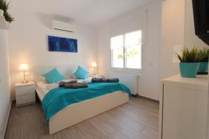 Ένα ή περισσότερα κρεβάτια σε δωμάτιο στο LEON INMO Villa Magna - 12262 +34 φωτογραφίες