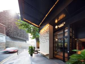 a storefront of a store on a city street at Ovolo Central in Hong Kong