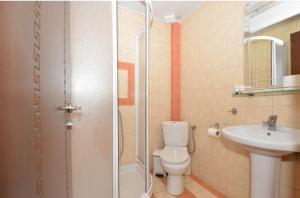 Een badkamer bij Hotel Philippion