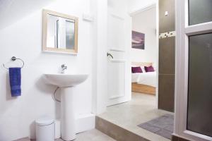Koupelna v ubytování Tamarin Chambres d'Hotes