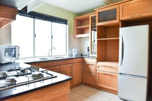 Kuchyň nebo kuchyňský kout v ubytování Tamarin Chambres d'Hotes