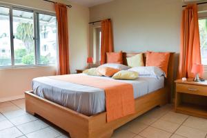 Voodi või voodid majutusasutuse Tamarin Chambres d'Hotes toas +26 fotot